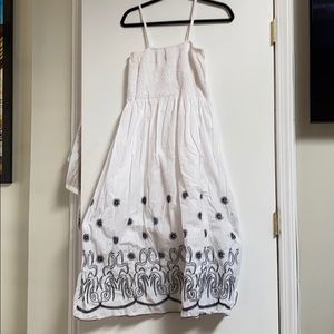 White and black embroidered summer dress.